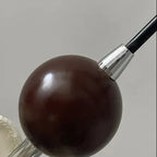 Brown spherical pendant light component with chrome socket attachment at top