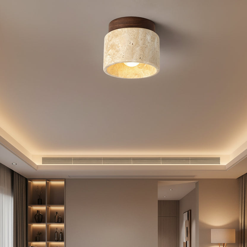 Flush mount ceiling light with small travertine drum shade and dark wood top ring
