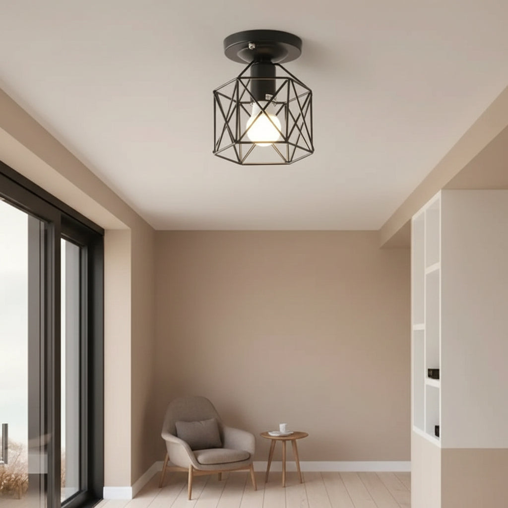 Geometric cage ceiling light with exposed bulb, black metal frame on flush mount