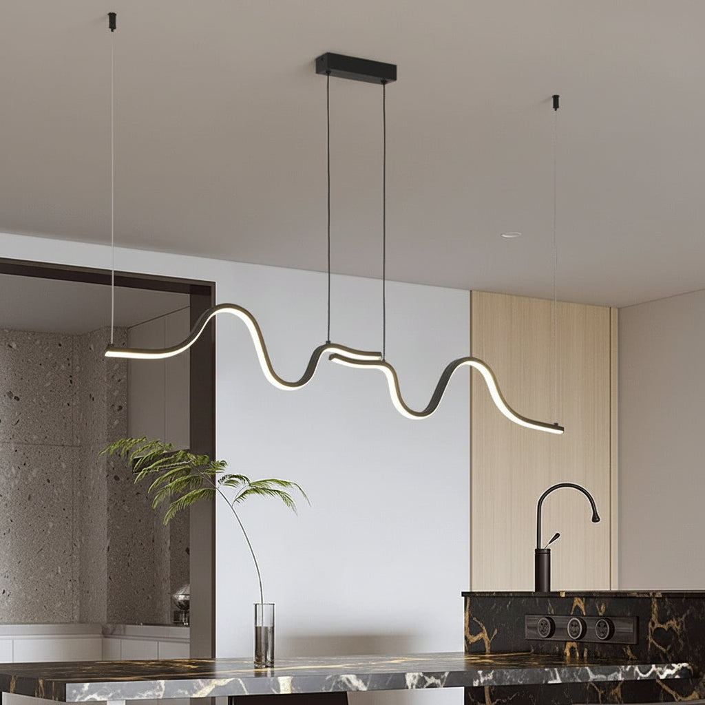 Wavy linear LED pendant light with dark ceiling box and long curved illuminated strip