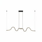 Asymmetrical wavy linear LED pendant light with two dark end fittings and cords