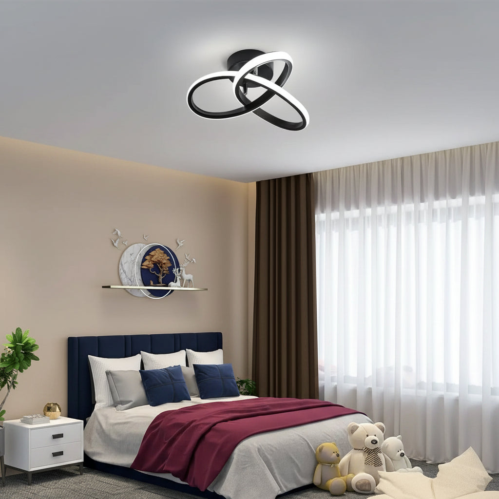 Chrome interlocking loop ceiling light with curved ring strips, flush mount fixture