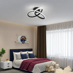 Chrome interlocking loop ceiling light with curved ring strips, flush mount fixture