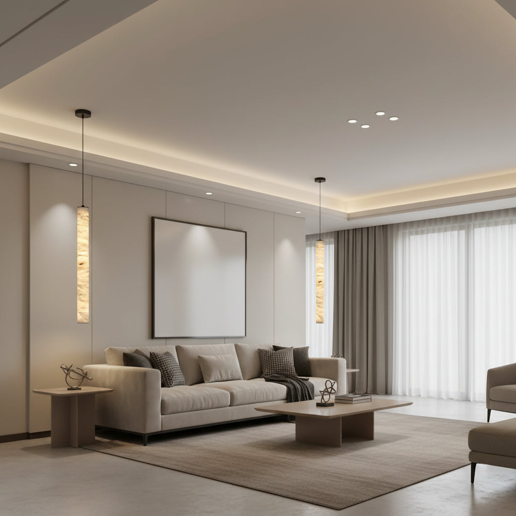 Slim tubular alabaster pendant light with cream shade and black ceiling mount.