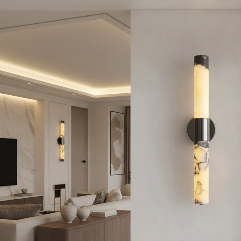 Cylindrical alabaster wall light with stainless steel ring and black circular bracket