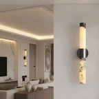 Cylindrical alabaster wall light with stainless steel ring and black circular bracket