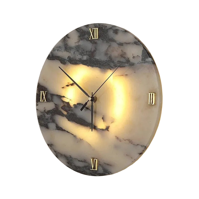 Round marble-pattern wall clock light with black hands, Roman numerals, backlit glow