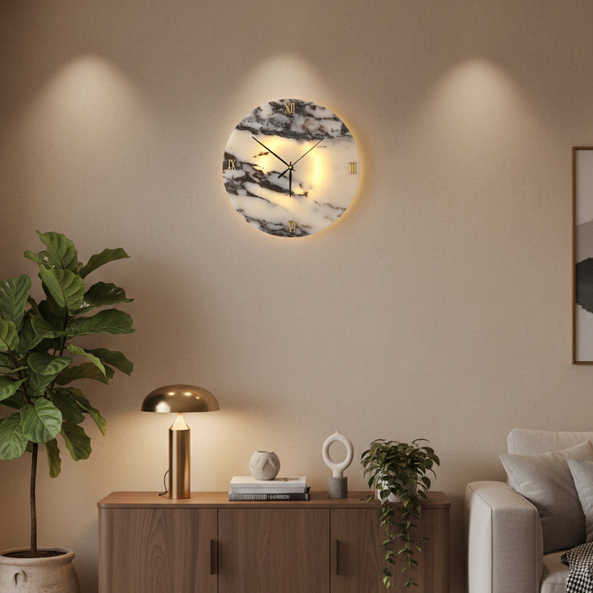 Round backlit wall clock light with marble design and Roman numerals in a living room