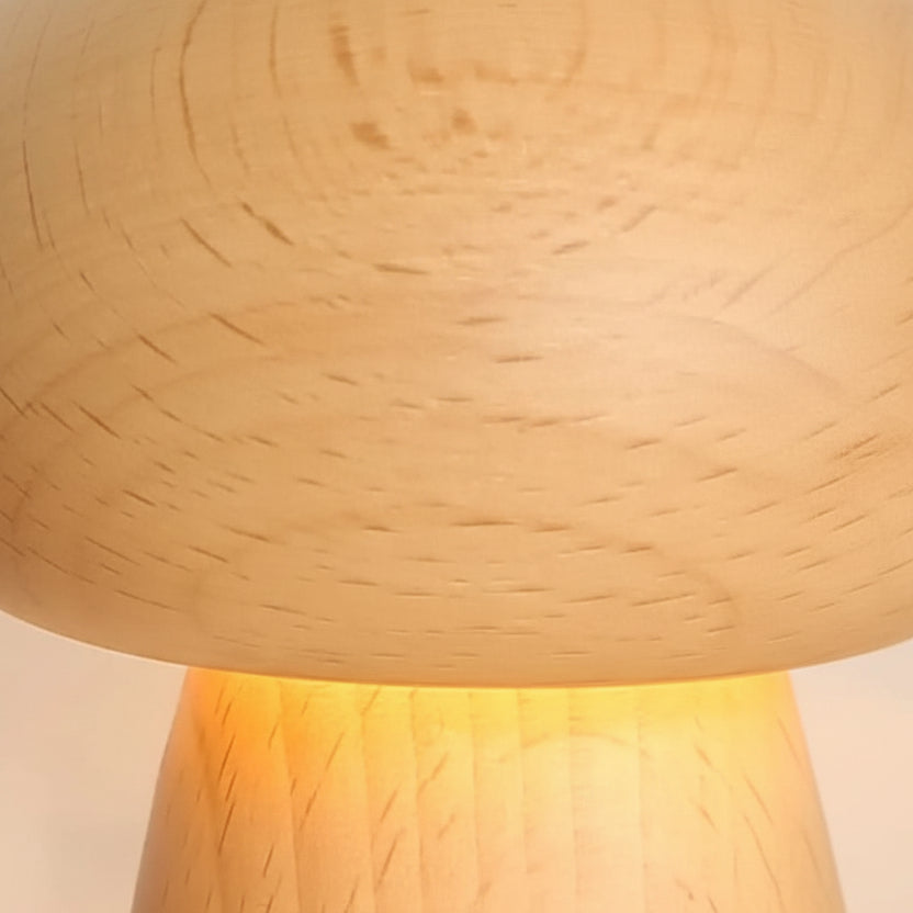 Close-up of light wood mushroom lamp shade with visible grain texture