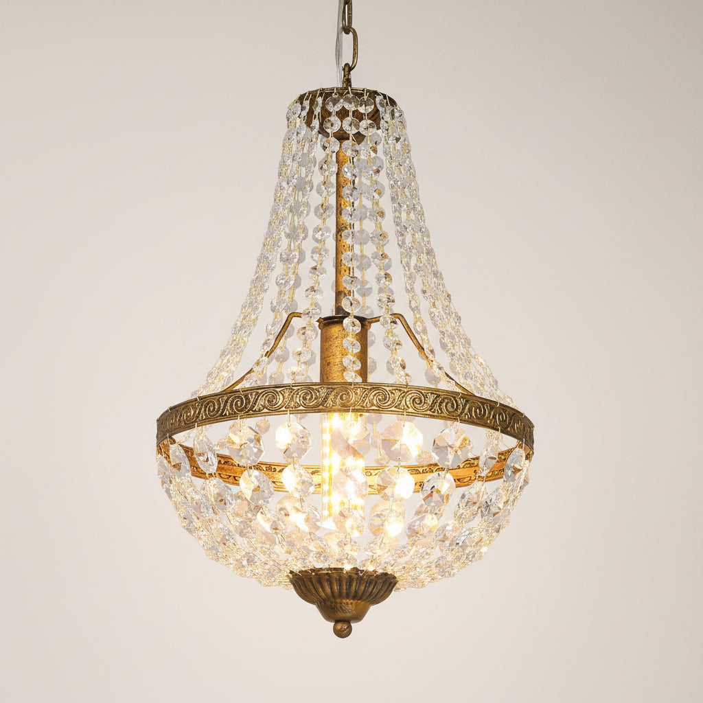 Bronze crystal basket chandelier with tiered crystal rim and glowing interior bulbs