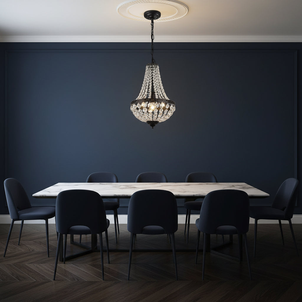Dark metal crystal basket chandelier with beaded shade centered above dining table