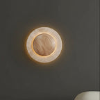 Round travertine wall light with bright circular backlight and wood-tone center
