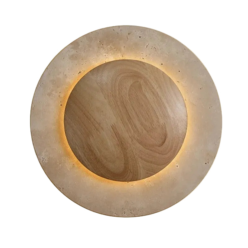 Round backlit wall sconce with travertine outer ring and wood-tone center disc