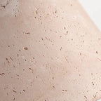 Close-up of speckled off-white conical lamp shade