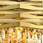 Detailed view of gold tiers and bright crystal prism drops in a stacked chandelier