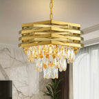 Gold tiered crystal chandelier with hanging prism drops beneath stacked metal bands