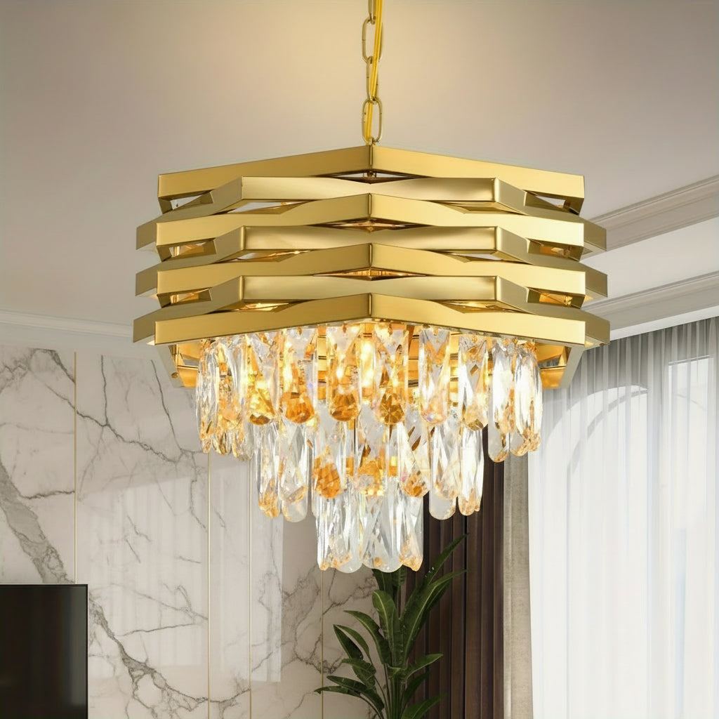 Gold tiered crystal chandelier with hanging prism drops beneath stacked metal bands