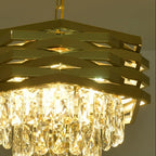 Gold tiered chandelier with faceted crystal drops and a stacked geometric frame