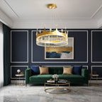 Gold tiered crystal chandelier with crown top and clear hanging pendants