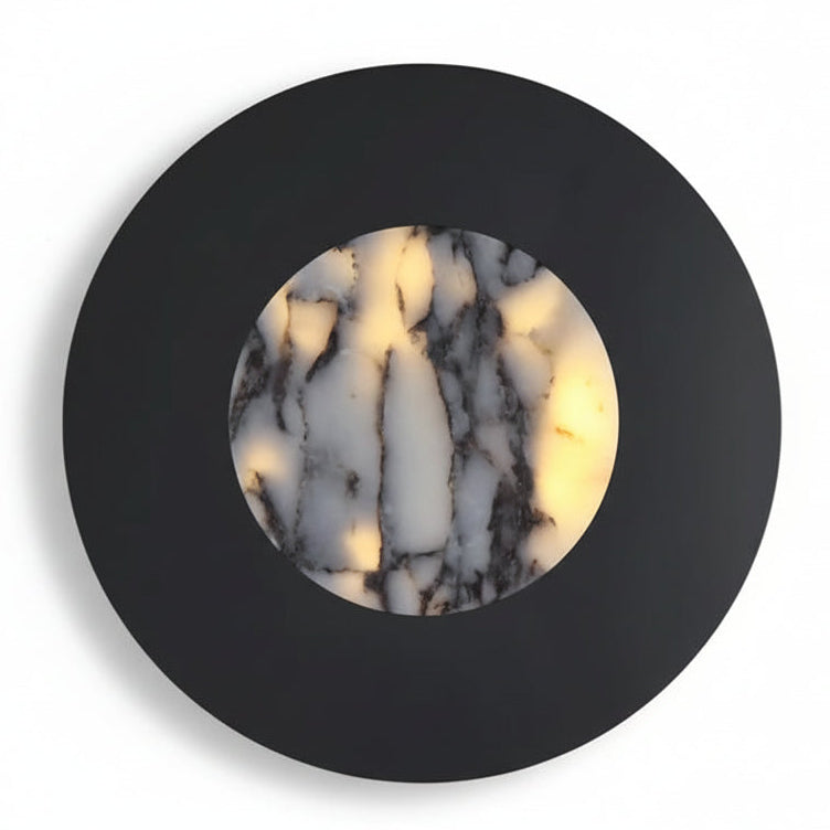 Round marble backlit wall sconce with black outer ring and marble inner circle