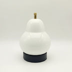 White gourd-shaped portable table lamp with gold top and black base.