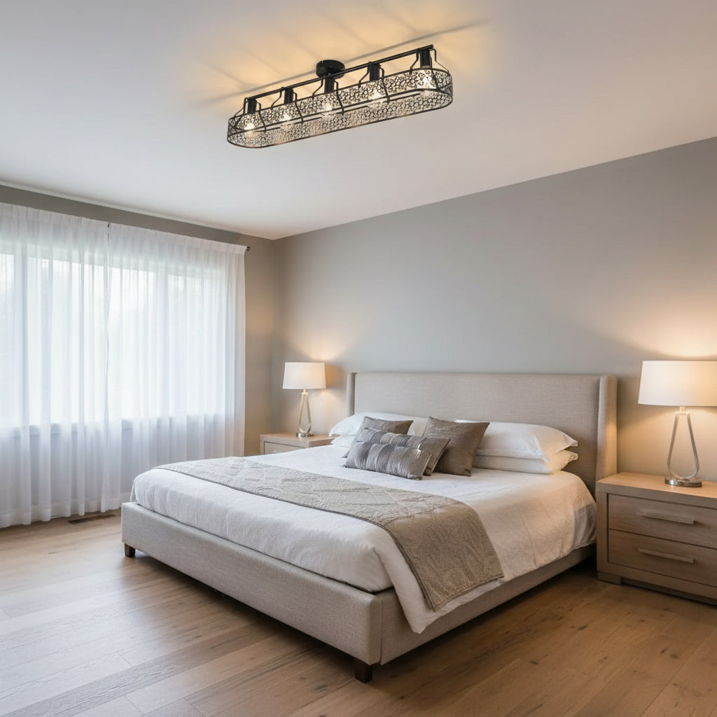 Black cage ceiling light with scrollwork frame and central flush mount canopy