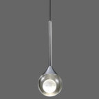 Single teardrop pendant light with reflective silver glass shade and bright circular inner glow