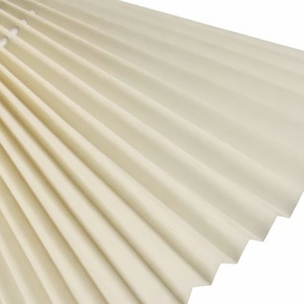 Close-up of white pleated lamp shade with evenly spaced ridges