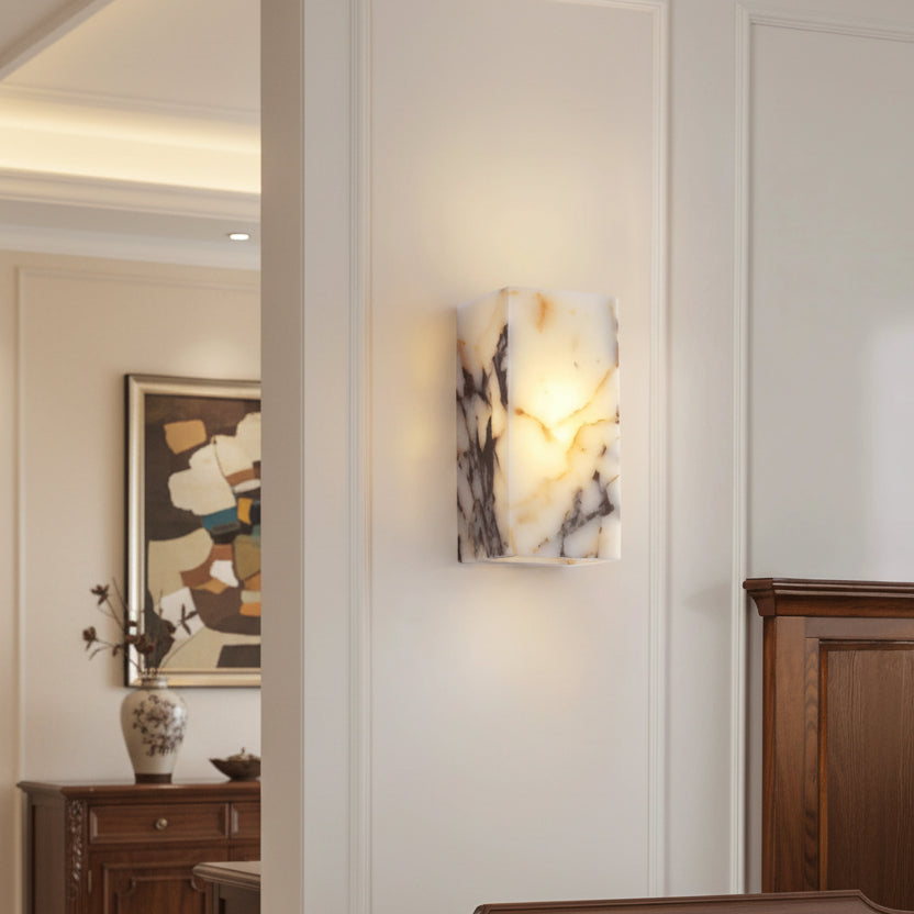 Rectangular marble wall light sconce with warm glowing light