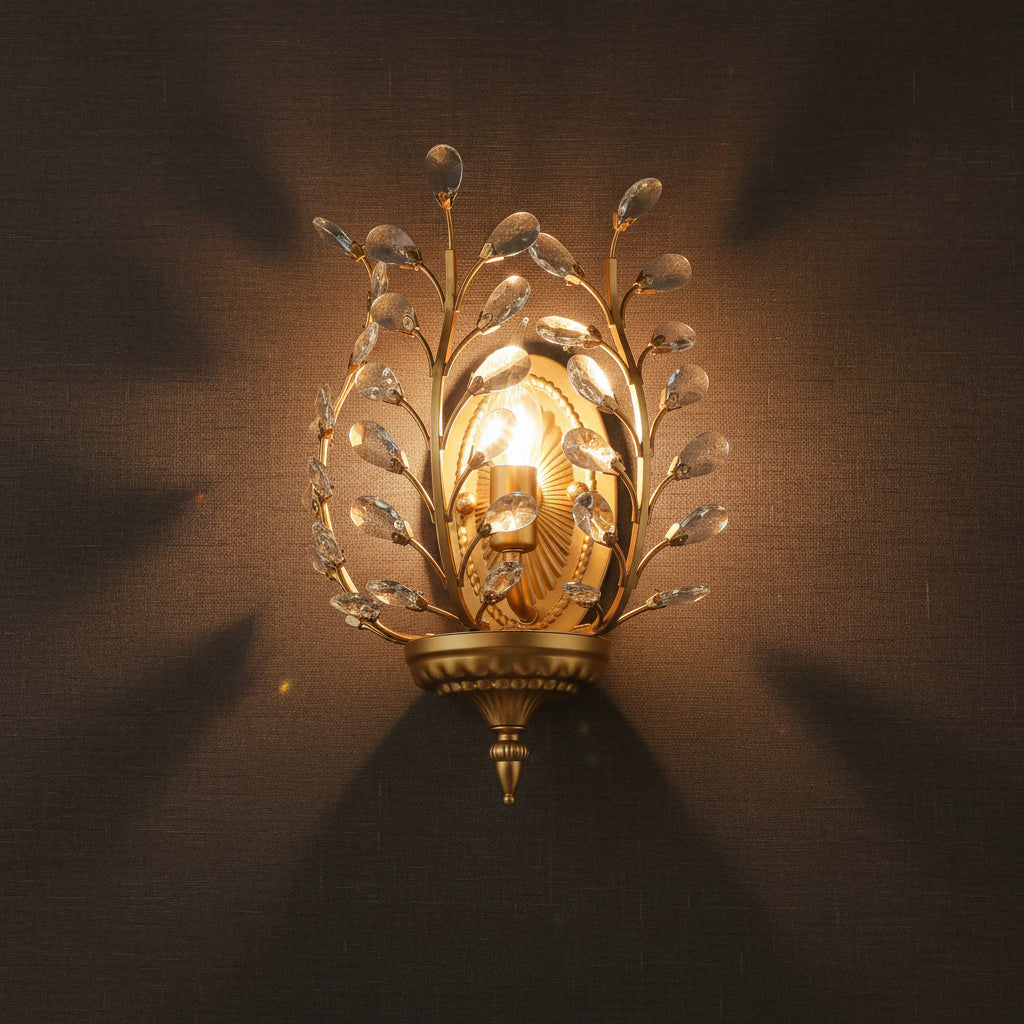 Gold botanical crystal branch wall sconce with warm glow and faceted clear ornaments