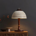 Minimalist ceramic dome table lamp with striped shade, dark wood stem, round base