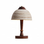 Ceramic dome table lamp with striped mushroom shade, dark wood pedestal, round base